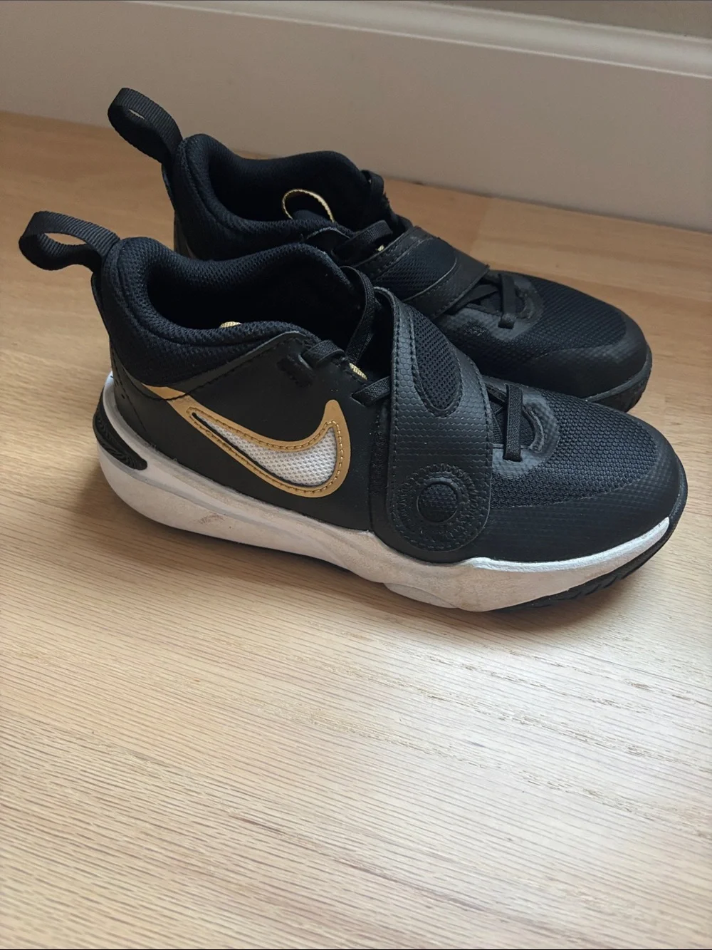 Nike Kids Black and Gold Basketball shoes